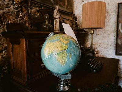 Detailed shot of a stone sphere on a desk.